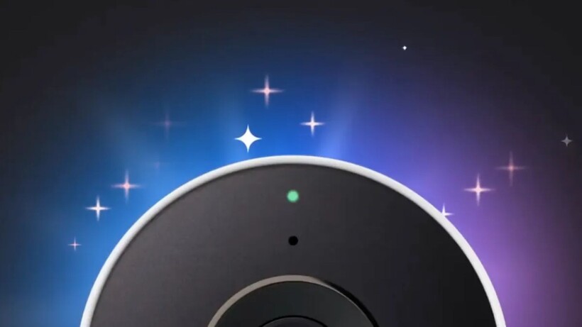 A security camera with stars coming out of it on a night sky background